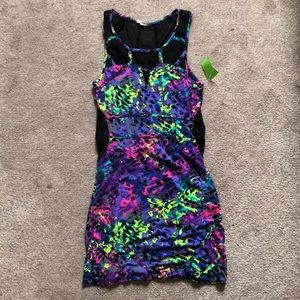 Never worn, tag still attached. Mini dress.